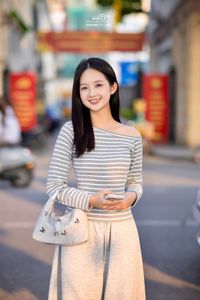 Natural beauty of a Vietnamese girl showcasing vibrant street fashion and a captivating smile-4