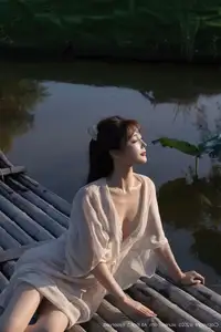 Discover Lu Xuan Xuan's Graceful Beauty in a White Dress Amidst a Serene Lotus Pond - XiuRen No.10630-1