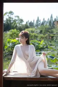 Discover Lu Xuan Xuan's Graceful Beauty in a White Dress Amidst a Serene Lotus Pond - XiuRen No.10630-30