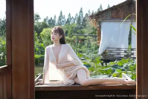 Discover Lu Xuan Xuan's Graceful Beauty in a White Dress Amidst a Serene Lotus Pond - XiuRen No.10630-18