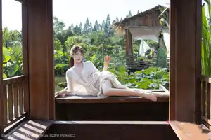 Discover Lu Xuan Xuan's Graceful Beauty in a White Dress Amidst a Serene Lotus Pond - XiuRen No.10630-33