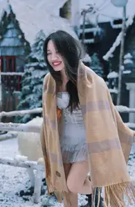 Radiant Beauty: Girl in Pristine White Dress Amidst Romantic Winter Wonderland 1000024890-4