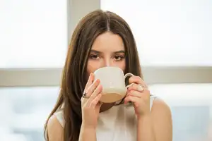 Gentle Smile by the Window: Serene Beauty in a Bright Window Scape-18