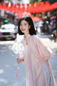 Elegant Vietnamese Girl on Red Lantern Street: Captivating Style & Cultural Charm-2