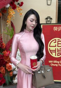 Radiant Vietnamese Beauty in Pink Ao Dai, Elegant Traditional Charm-0