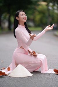 Pink Ao Dai Grace: Vietnamese Beauty with Elegant Girl and Traditional Conical Hat-11