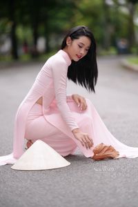 Pink Ao Dai Grace: Vietnamese Beauty with Elegant Girl and Traditional Conical Hat-5