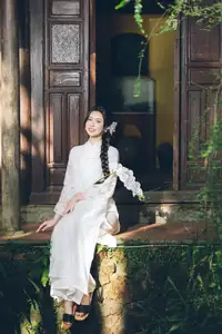 Charming Young Woman in White Lace & Orchids: Radiant Natural Beauty Amidst Greenery 1000026906-9