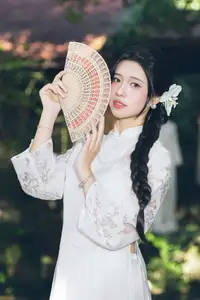 Charming Young Woman in White Lace & Orchids: Radiant Natural Beauty Amidst Greenery 1000026906-7