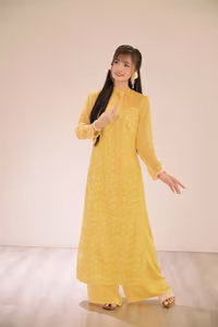VGU No.105: Vietnamese Girl in Yellow Áo Dài Shines in Modern City – Captivating Beauty-4