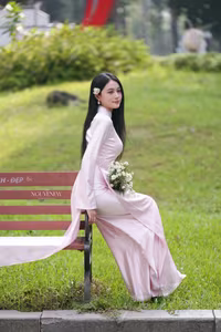 VGU No.119: Elegant Vietnamese Beauty in Pink Ao Dai Amidst Nature's Serenity-4