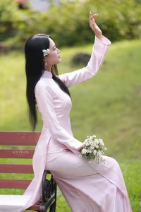 VGU No.119: Elegant Vietnamese Beauty in Pink Ao Dai Amidst Nature's Serenity-9