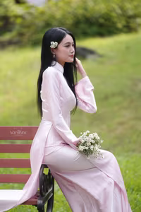 VGU No.119: Elegant Vietnamese Beauty in Pink Ao Dai Amidst Nature's Serenity-7